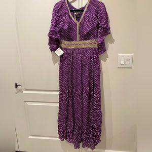 Beautiful purple long dress that can look like a kaftan style.